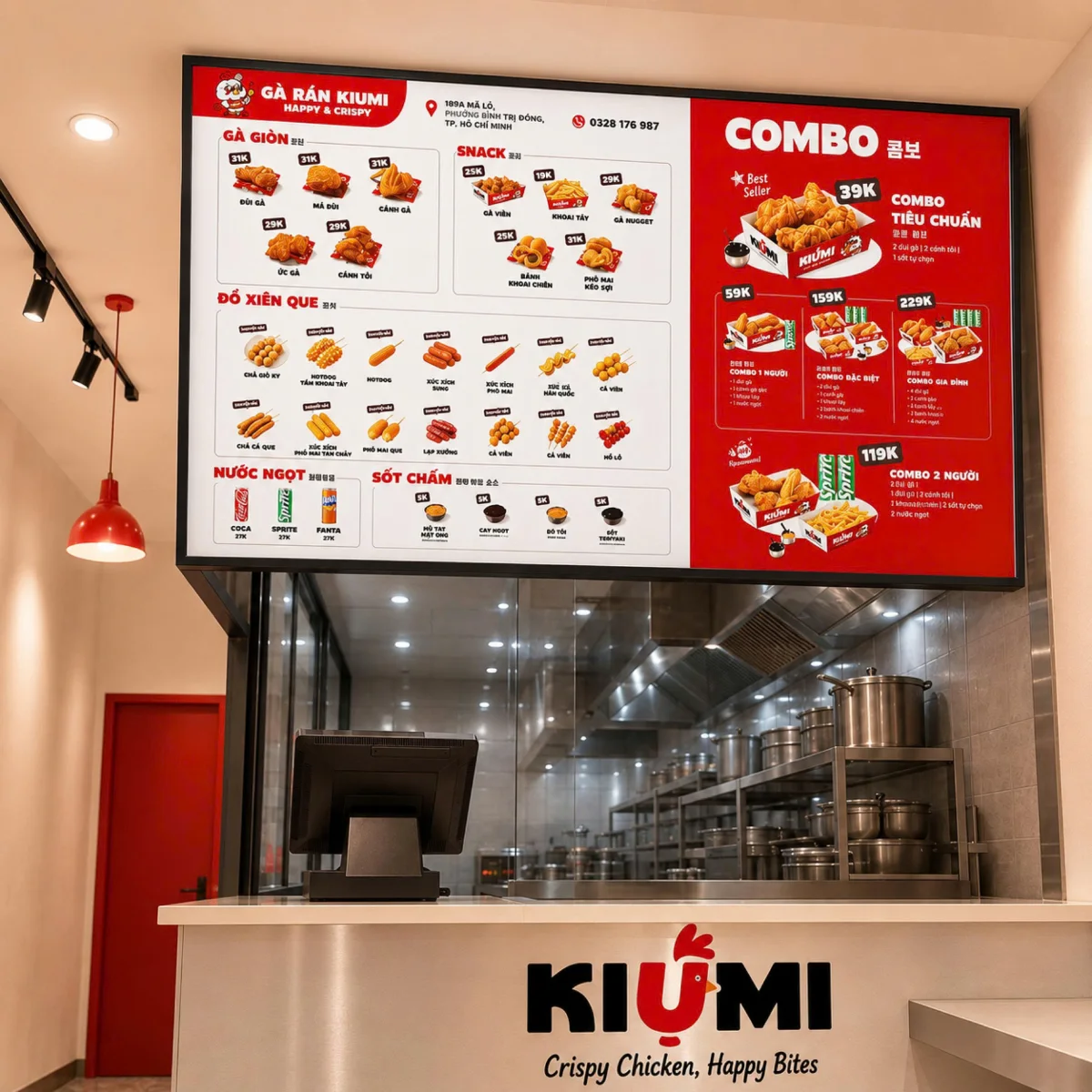 Quầy KIUMI thực tế với màn hình bán hàng và khu bếp mở bằng thép không gỉ phía sau kính